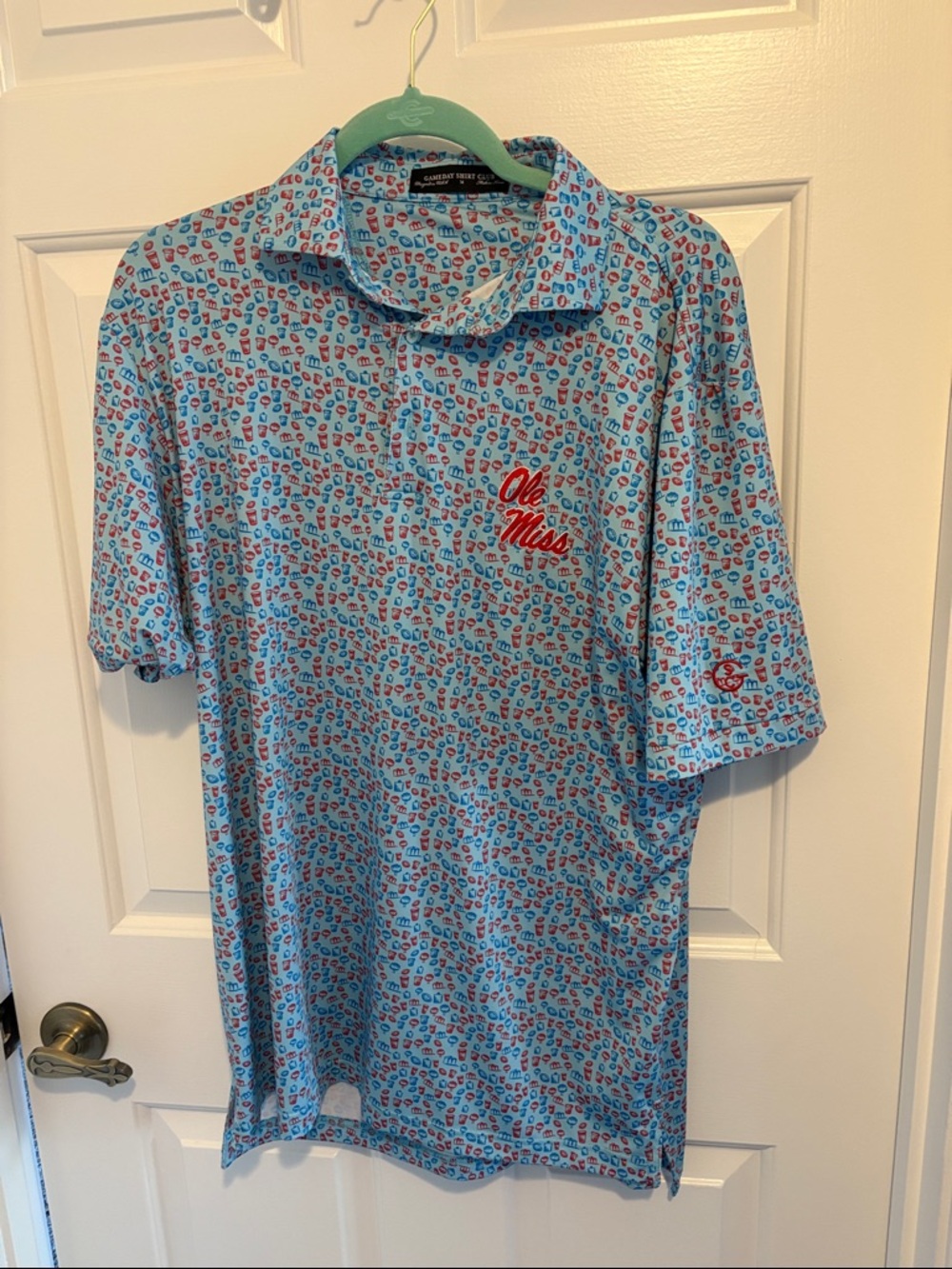 Ole miss grove Light Blue Logo Performance Polo Shirt